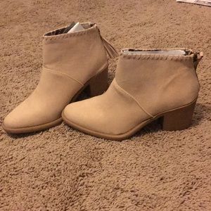 Tan high heeled ankle boots