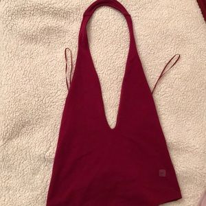 Dark red bodysuit top.