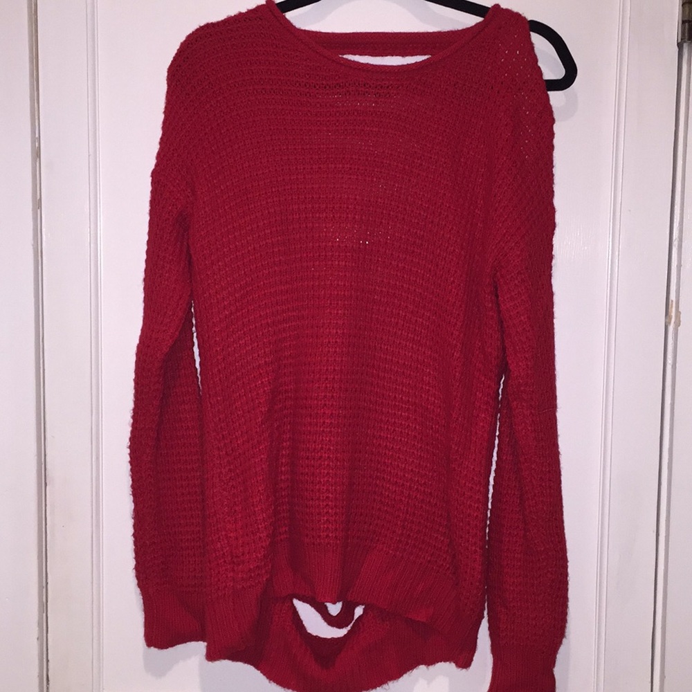 Red sweater with slits