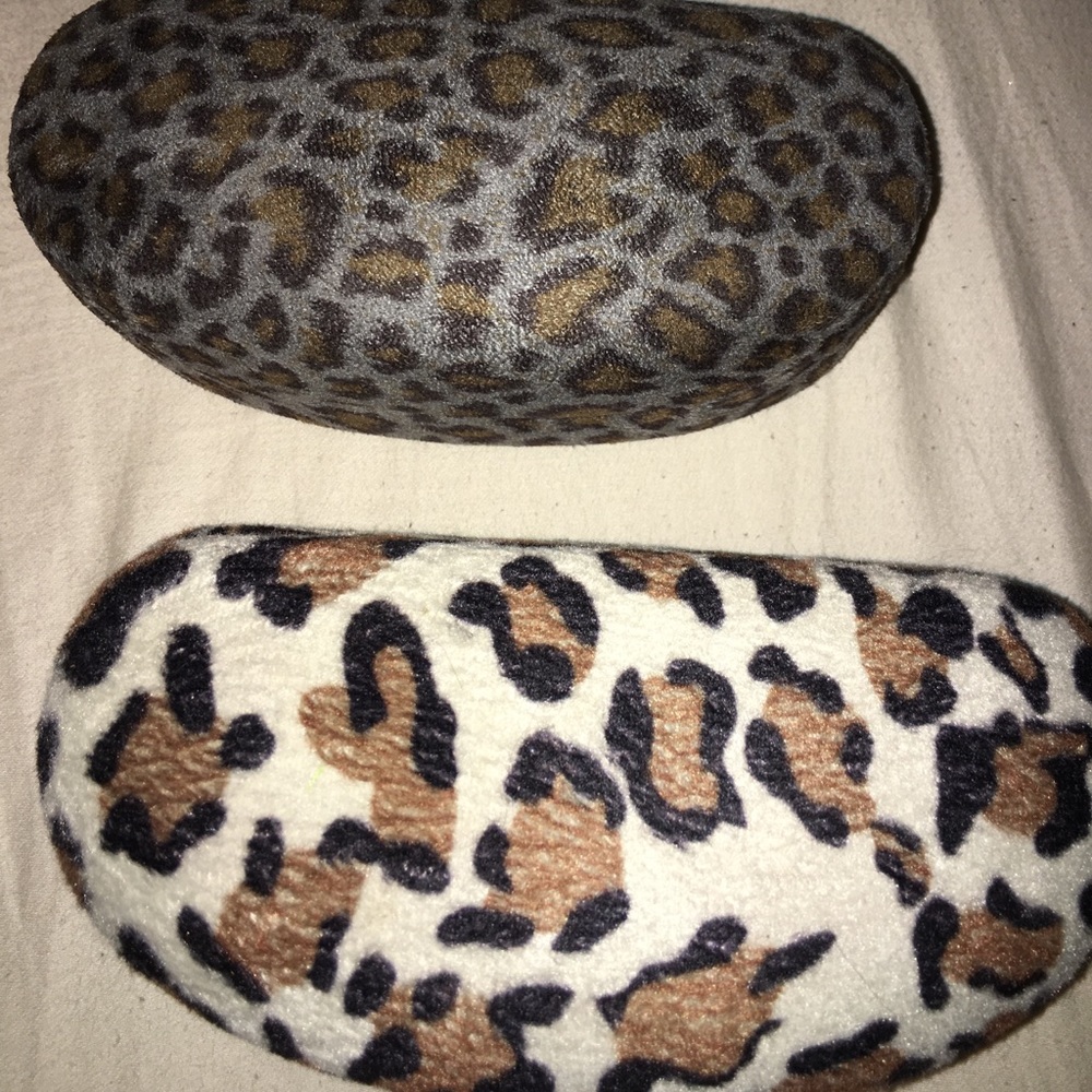 2 animal leopard print sunglass or eyeglass case.