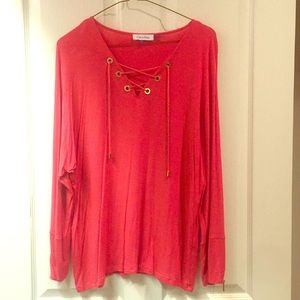 Calvin Klein pink top.