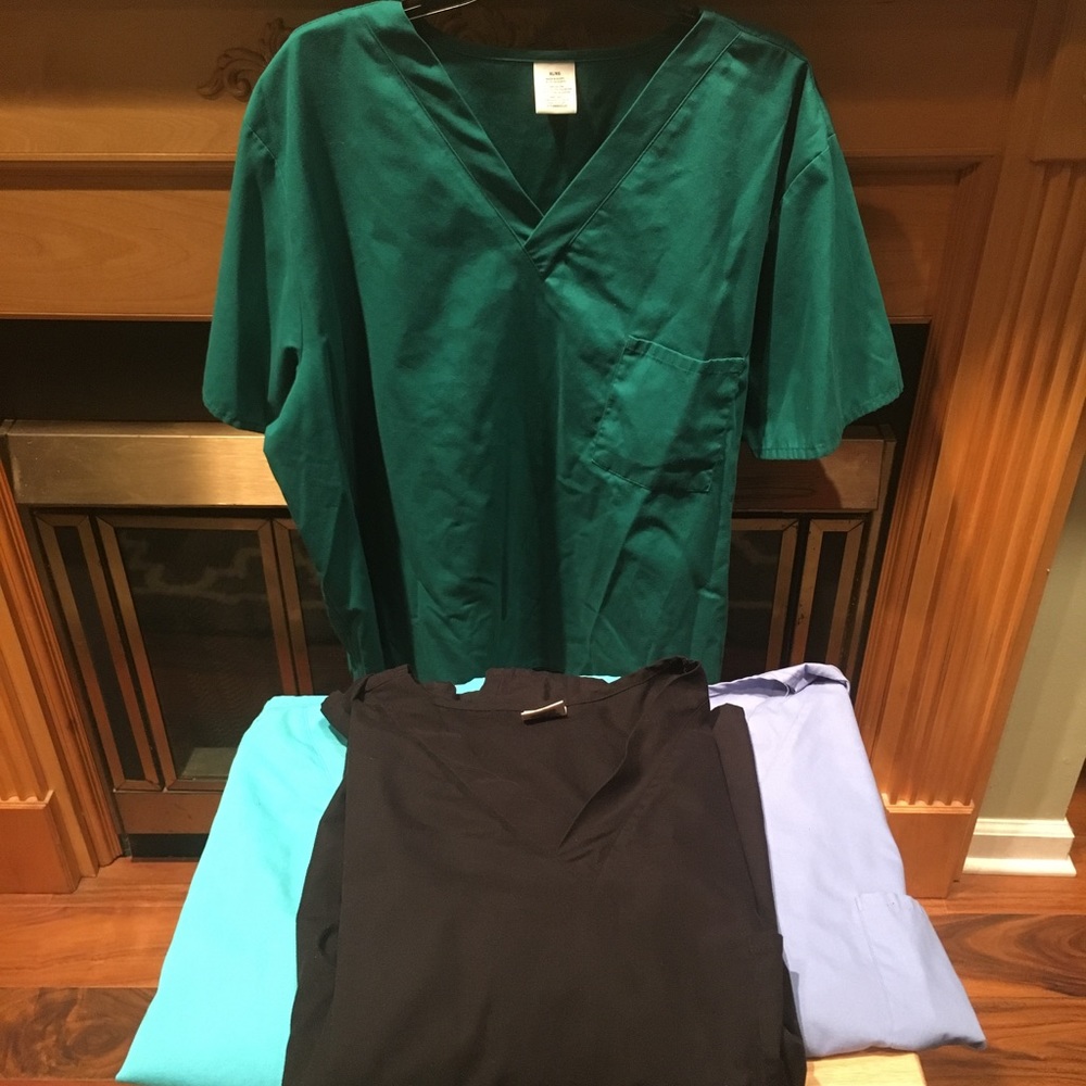 Basic scrub tops. 4 for the price of 1 !