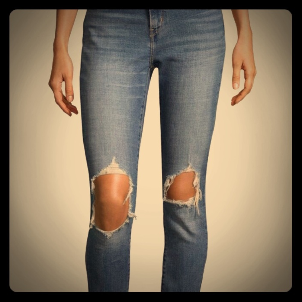 Levi’s 721 high rise skinnies with open knees