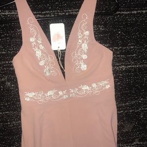 Brand new Latiste Long flare jumpsuit.