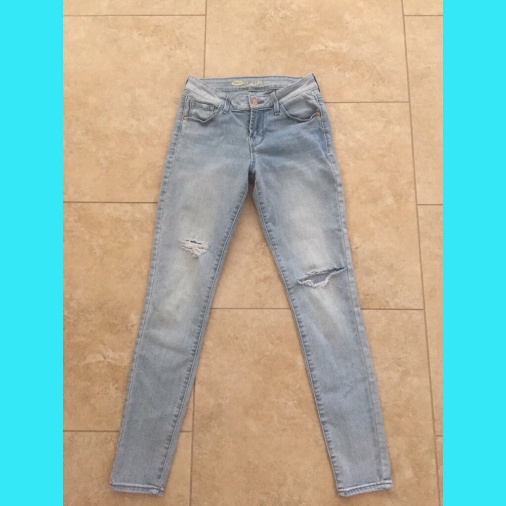 Light blue distressed skinny jeans