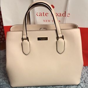 Beige kate spade leather hand bag