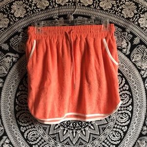 orange tennis skirt from urban outfitters 🔥