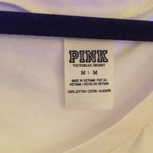 Pink longsleeved white shirt