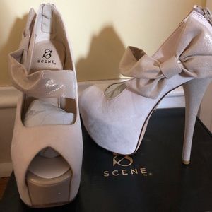 Cream high heels with bow