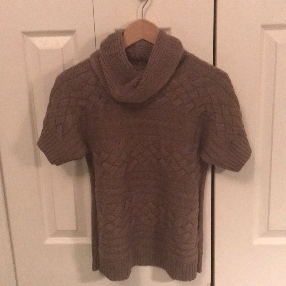 Taupe cowl neck sweater.