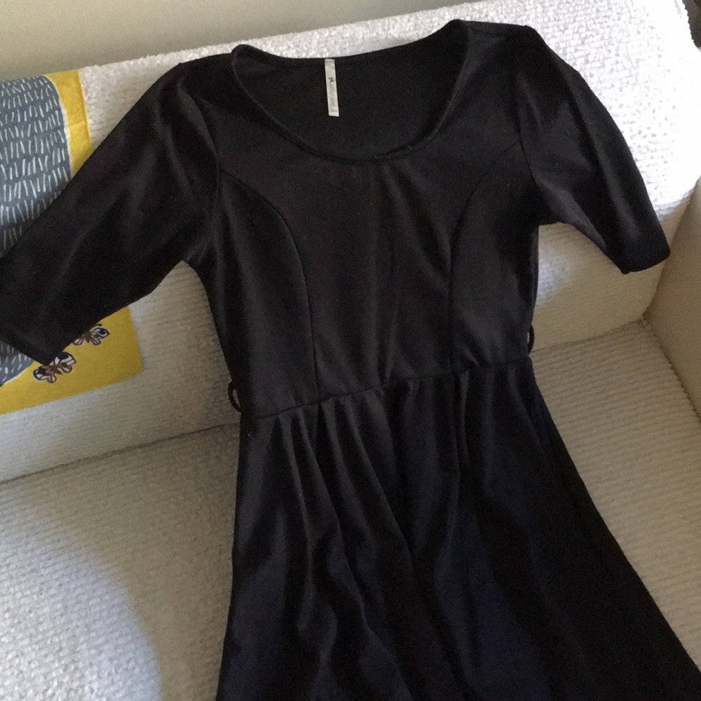 Beautifully cut black dress- from work to fun!