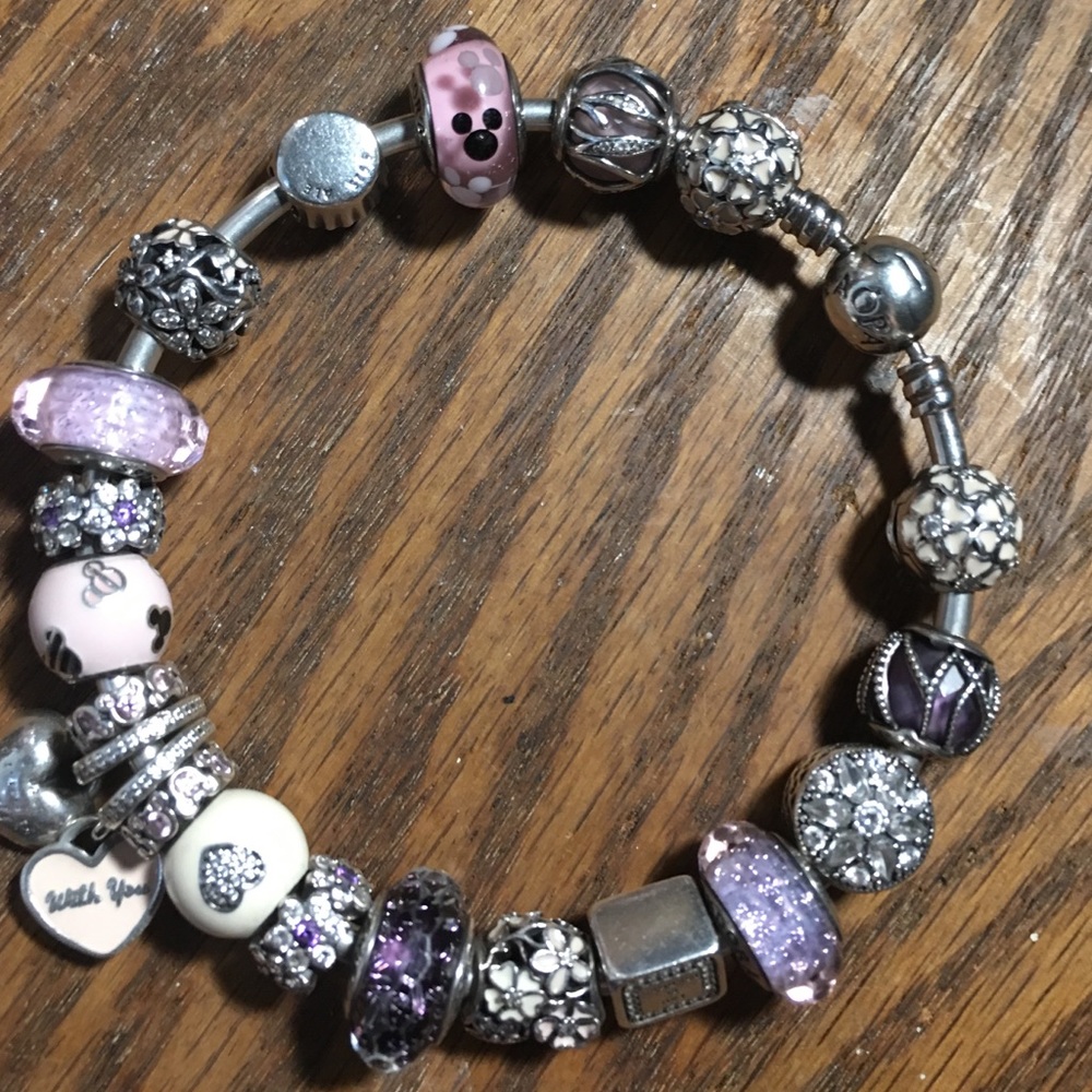 Authentic Pandora bracelet with beads included