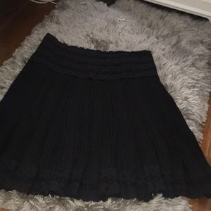 Black floral pleated skirt