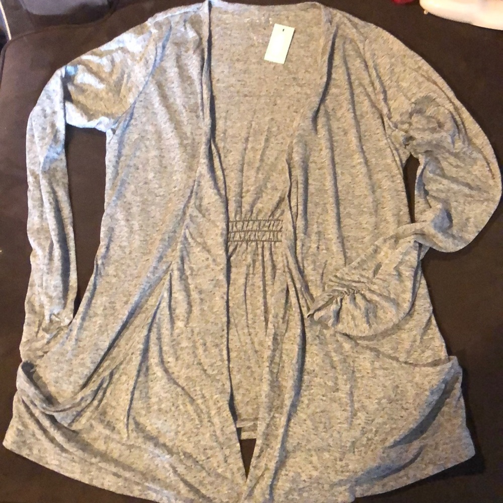Maurice’s grey cardigan with ruched sleeves.