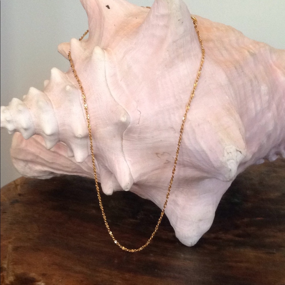 Gold tone necklace.
