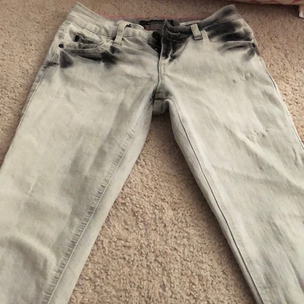 Black and white distressed jeans