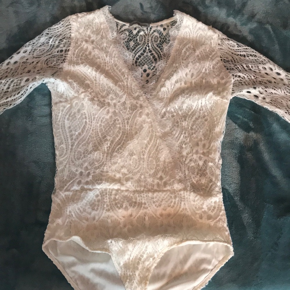 All white one piece shirt from Charlotte Russe