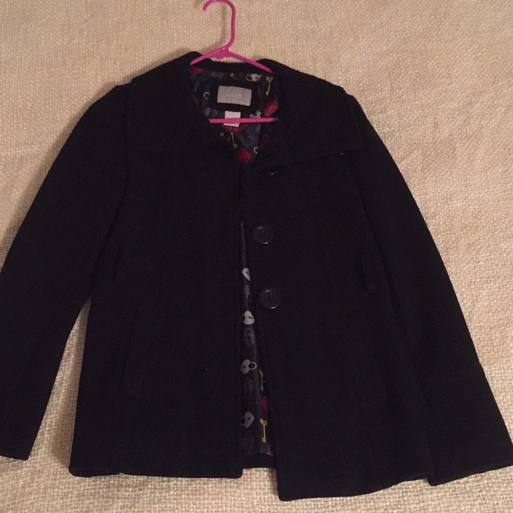 Delia’s black wool coat