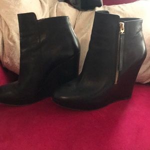 Black MK wedge leather boots