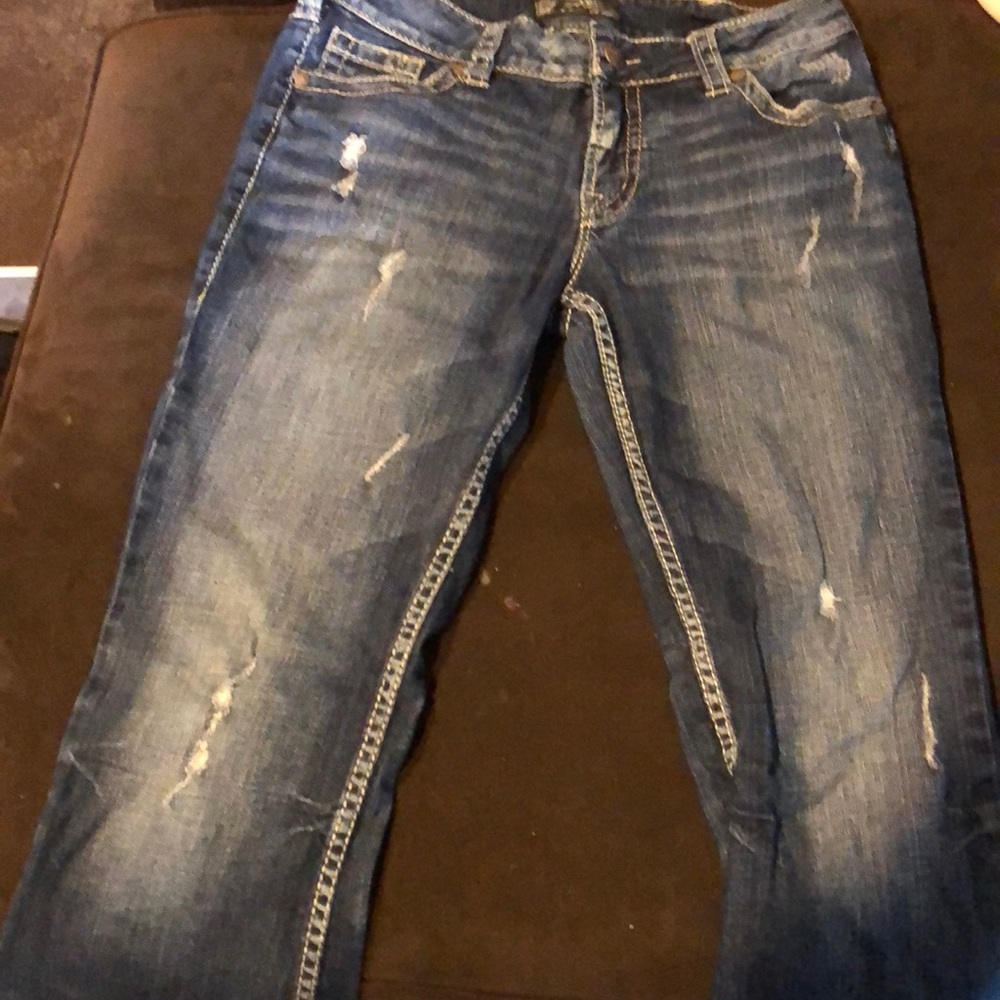 Silver suki surplus boot cut jeans.
