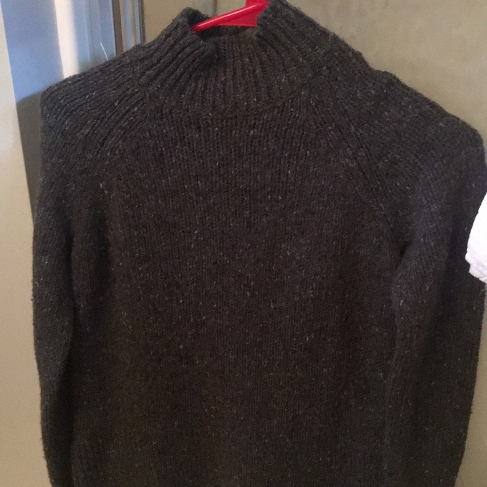 Green wool turtleneck sweater
