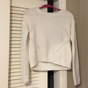 Slightly cropped white cable sweater