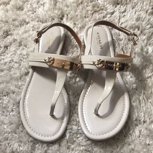 White leather coach flats