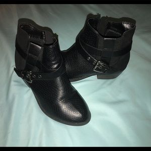 Black buckled ankle boots
