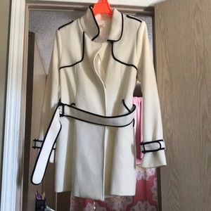 Ivory trench coat w black piping. NWT.