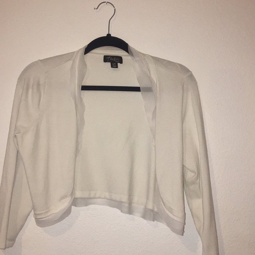 White cardigan.