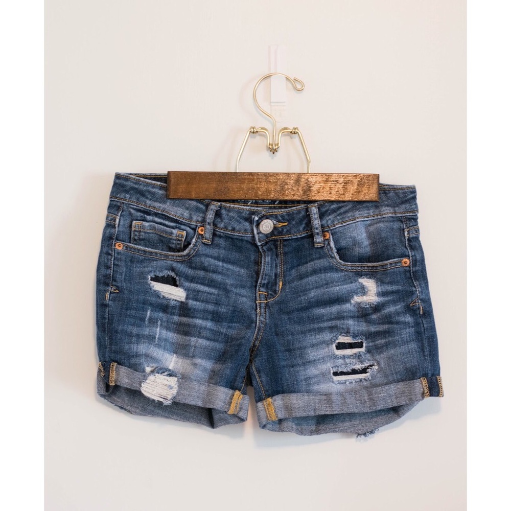 Woman’s Distressed Jean Shorts