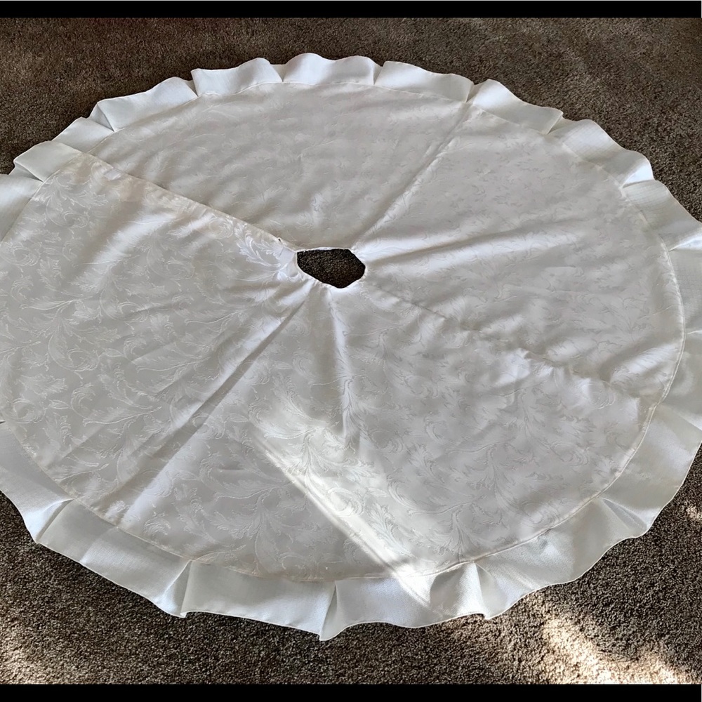 Cream colored Christmas tree skirt, 54”