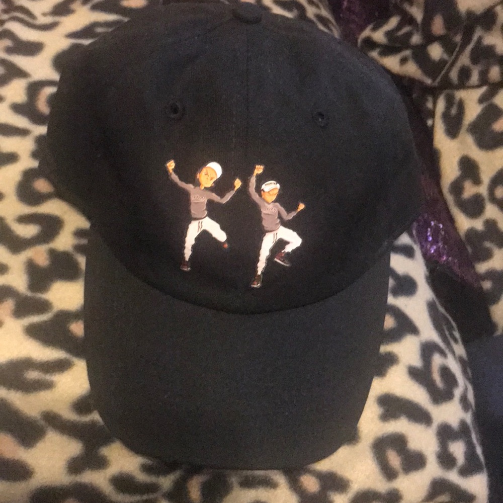 Trappin Cap two guys hitting the folks