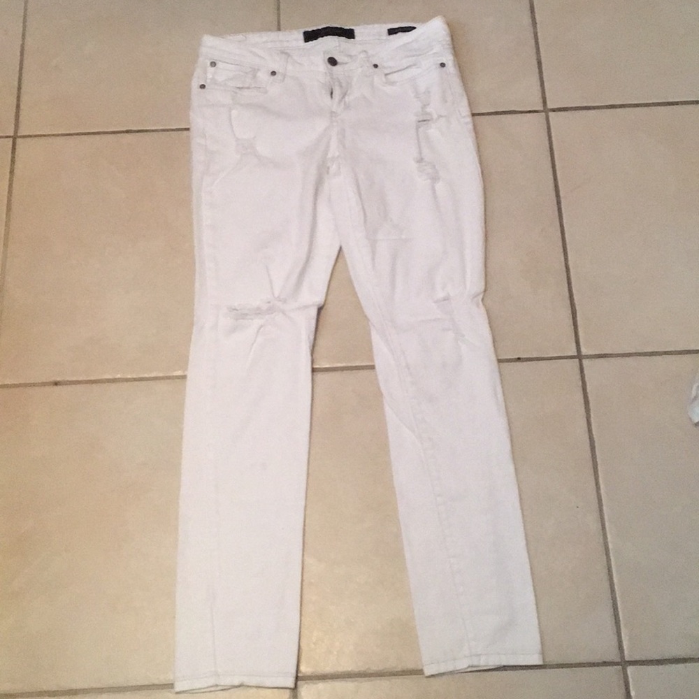 Ripped white skinny jeans