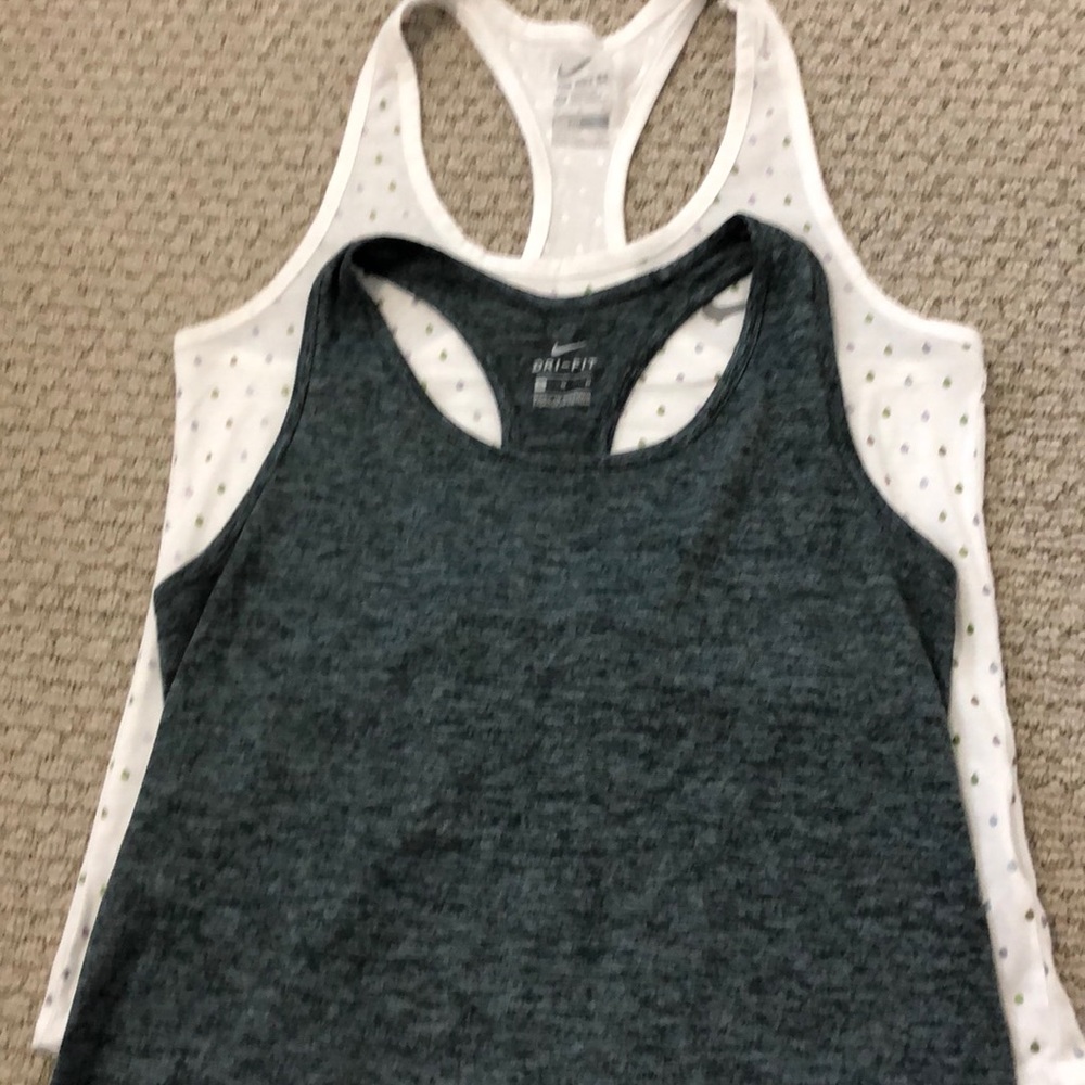 2 dri-fit Nike tanks size medium