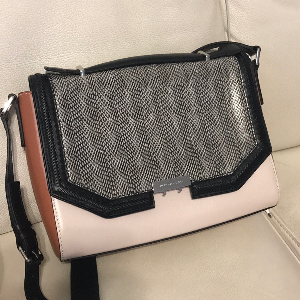 BCBG Gemma purse in tan black and snake print.