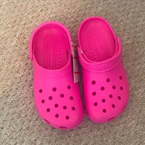 Pink crocs