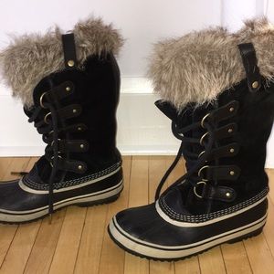 Black and white sorel waterproof winter boots