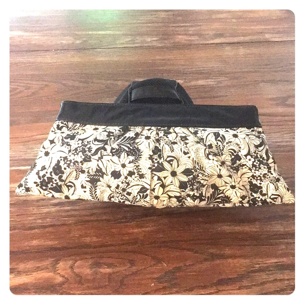 Lauren Merkin flower clutch with patent top.