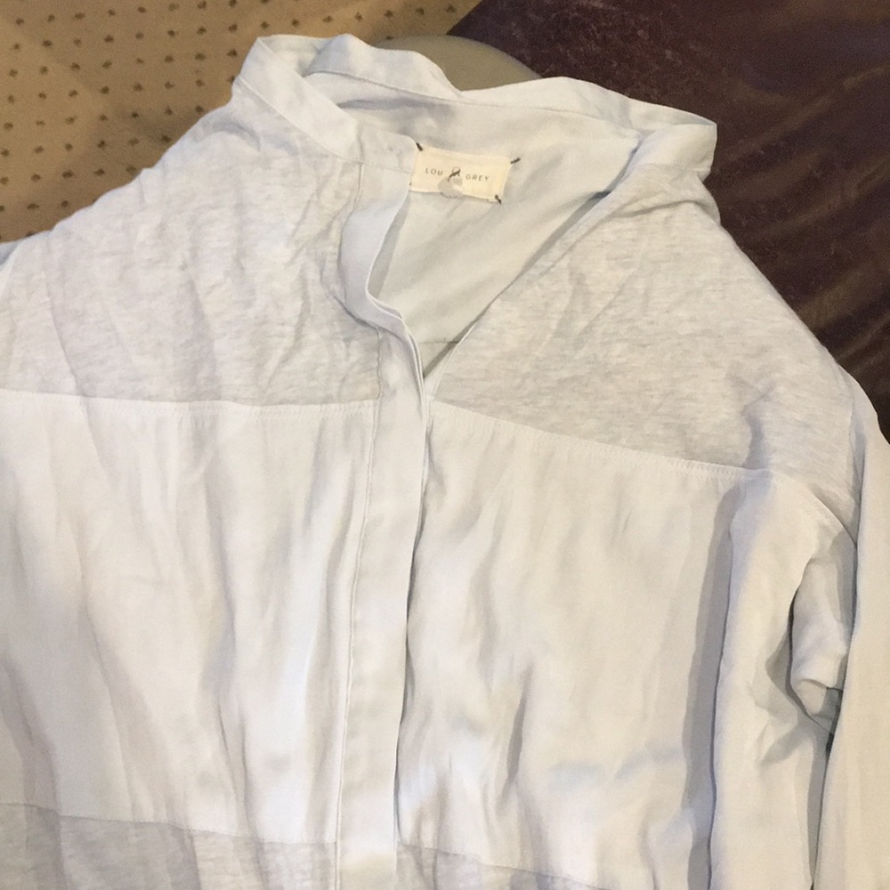 Long sleeve button down shirt.