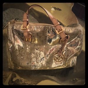 Micheal Kors metallic  gold  monogram