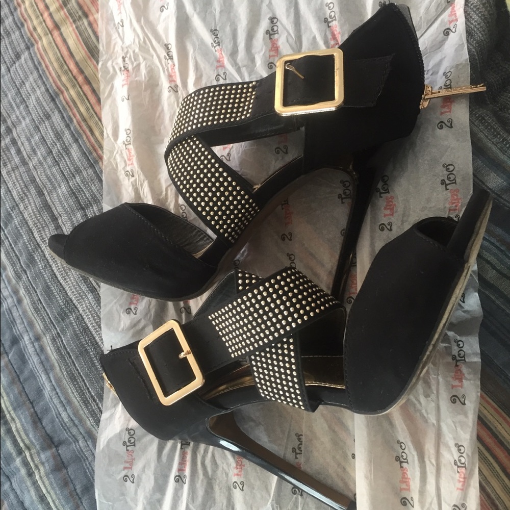 Black and gold high heels