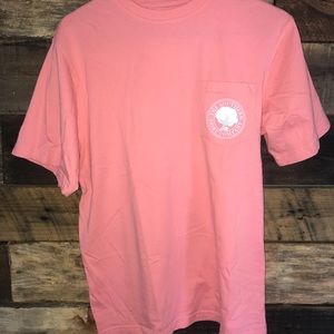 Pink t-shirt.