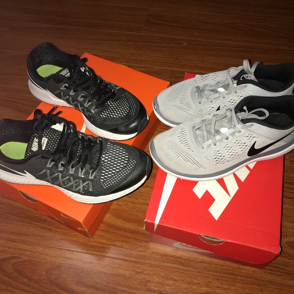 2 pairs of nike shoes
