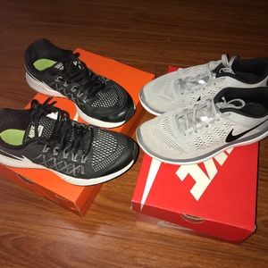 2 pairs of nike shoes