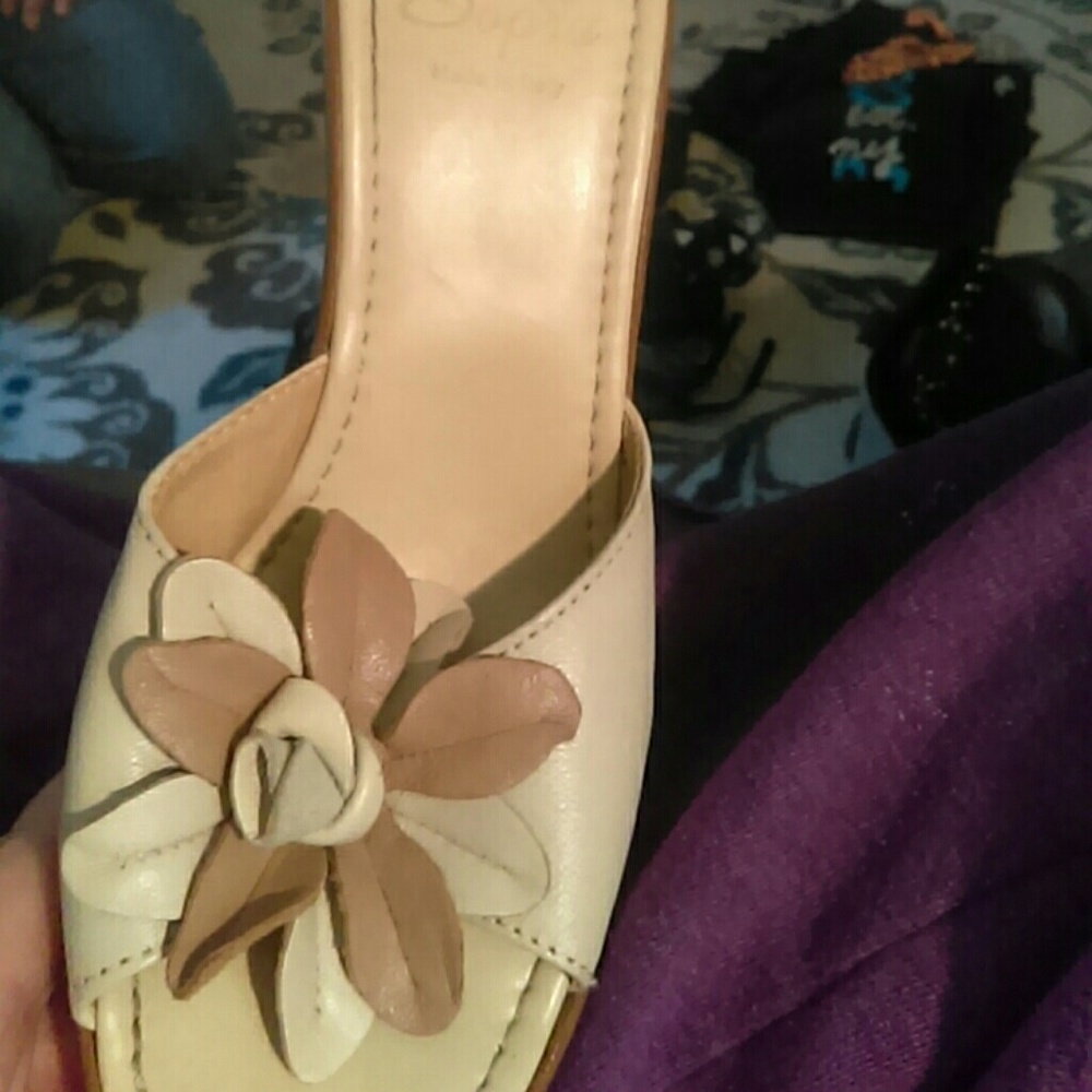 Cream and tan clogs