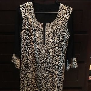 Black and white intricate embroidery on Kurta