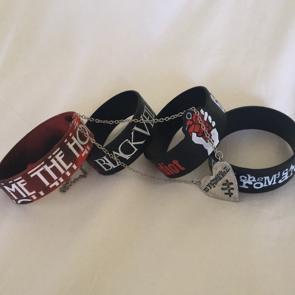 Hot topic band merch: 4 bracelets and 1 necklace