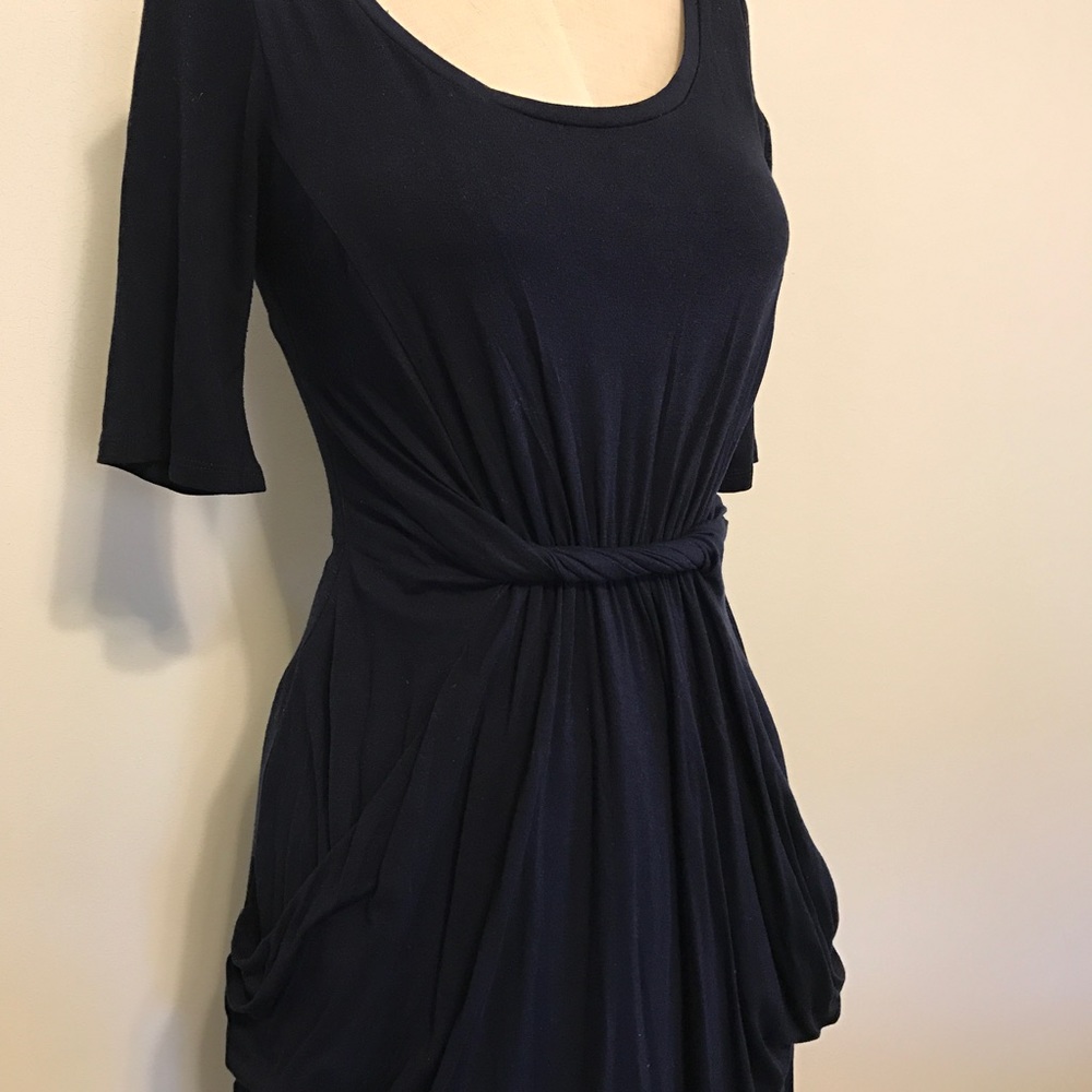 Navy knit dress with pockets.