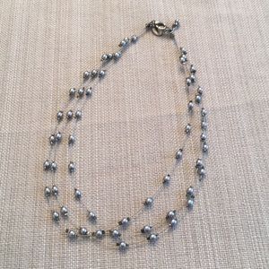 Classic Express 3 strand silver pearl necklace.